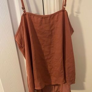 Two tank tops both large